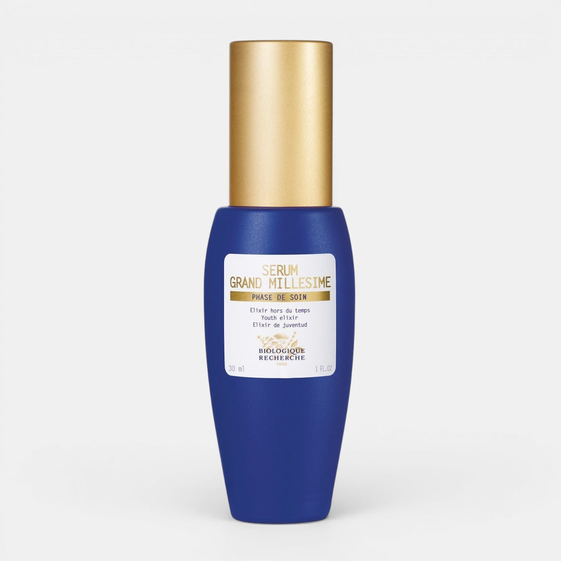 Biologique Recherche Sérum Grand Millésime (1.0 fl.oz) – A sleek blue serum bottle with a gold cap, elegantly displayed on a clean white background.