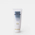 Biologique Recherche Shampooing Nutri-K in a white, squeezable tube with blue lettering and the Biologique Recherche logo, displayed on a clean white background. A nourishing shampoo designed to repair and hydrate dry, damaged hair. Size 2.54