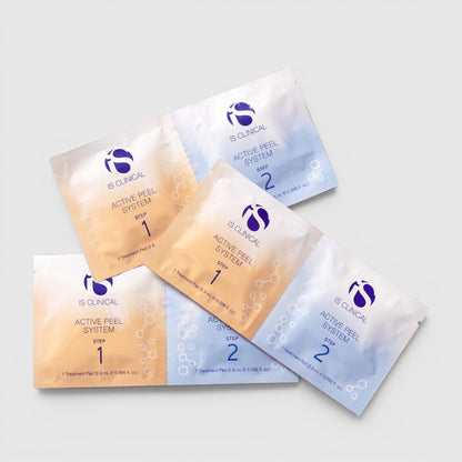 Shop Rescue Spa IS Clinical Active Peel System two-step exfoliating treatment sachets in orange and blue packaging