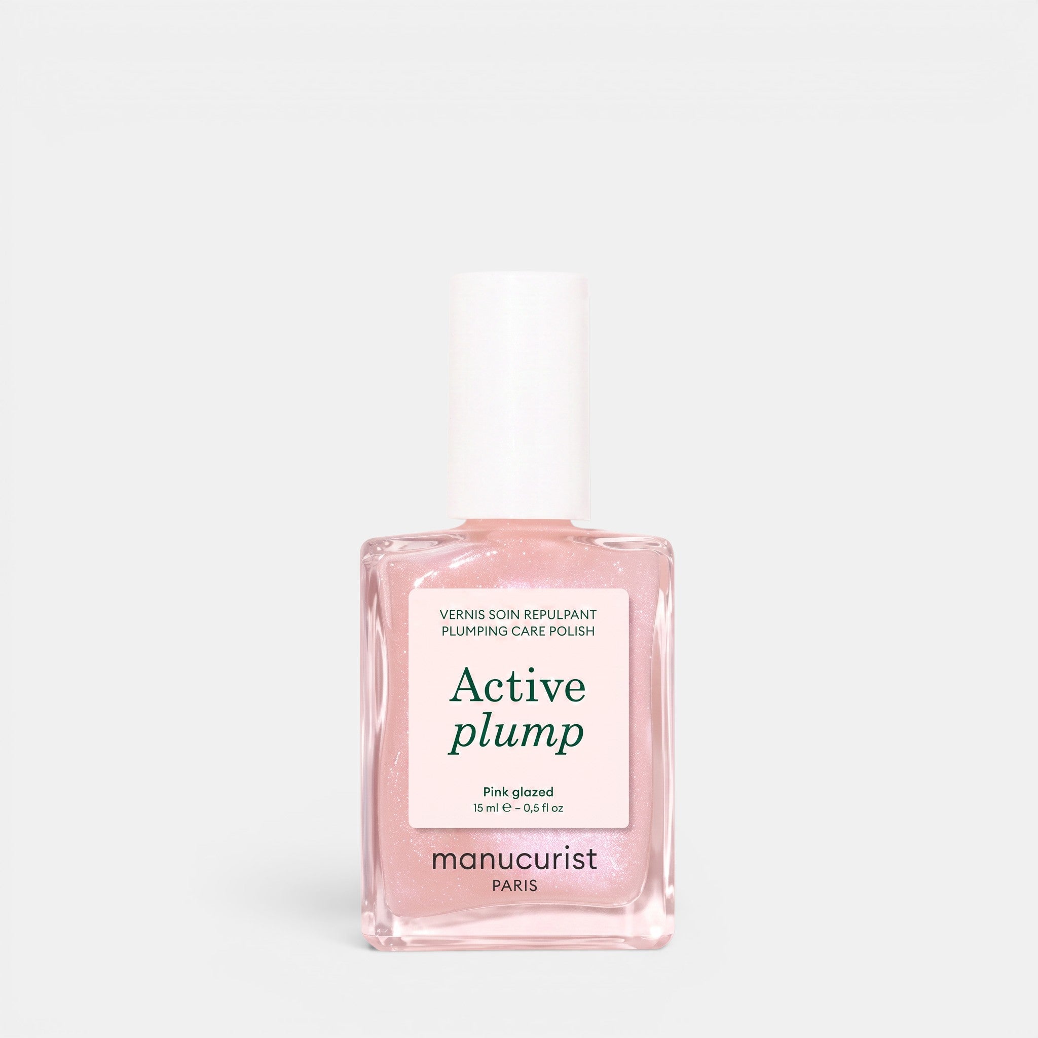 Shop Rescue Spa Active Plump collagen-infused nail polish in a pearly baby pink finish with a gel-like texture.