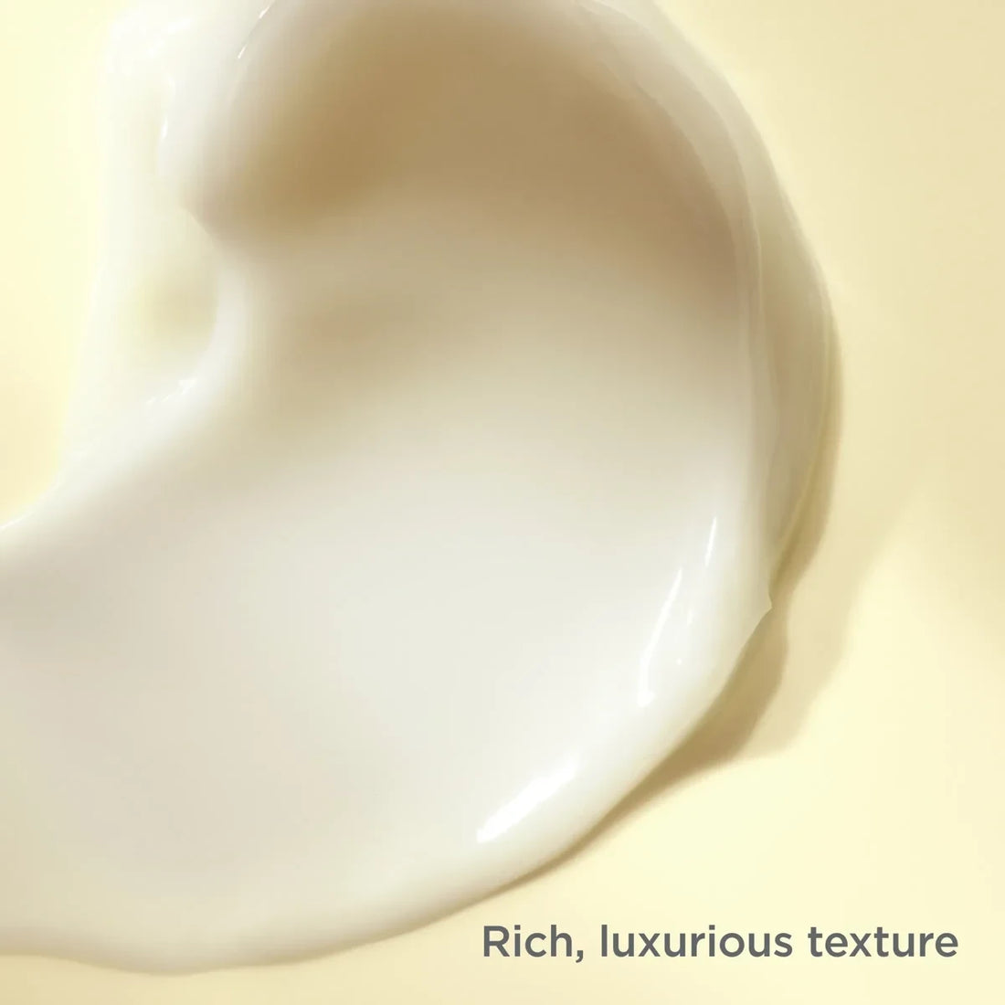 Shop Rescue Spa Age Contour Night cream showing a rich, smooth, and luxurious white texture on a pale yellow background.