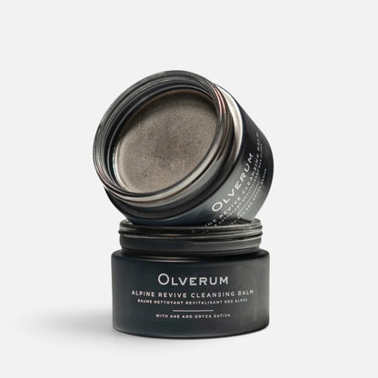 Shop Rescue Spa Alpine Revive Cleansing Balm in a black jar with the lid off, showing the dark grey balm texture.