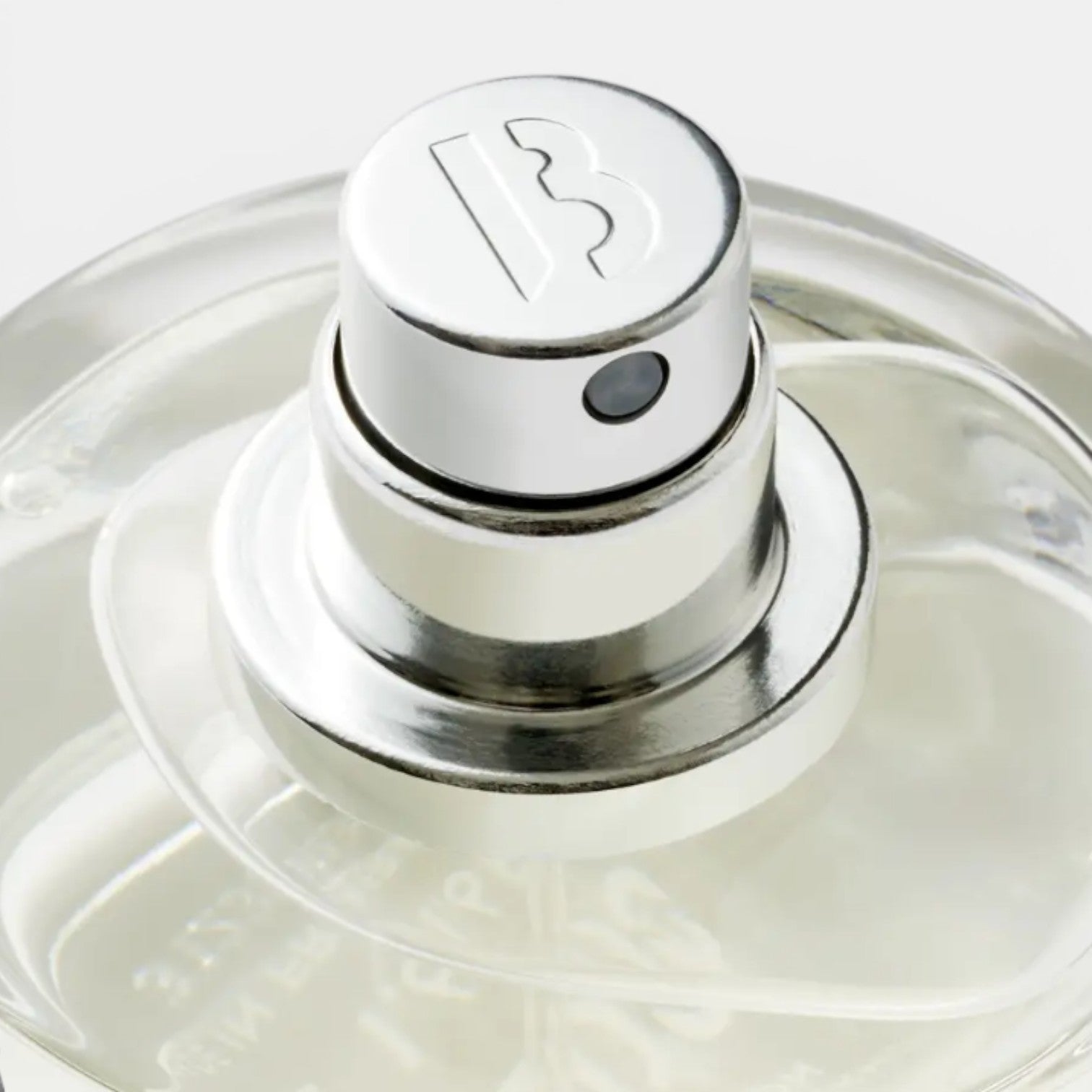 Shop Rescue Spa Alto Astral Eau De Parfum, clear glass bottle with silver cap and embossed logo.