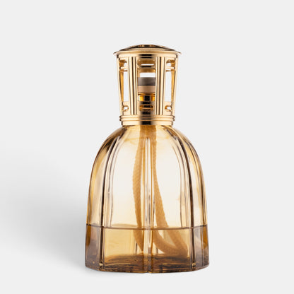 Shop Rescue Spa Dr. Vranjes Firenze amber glass Lamparfum with a gold metallic cap and octagonal base design.