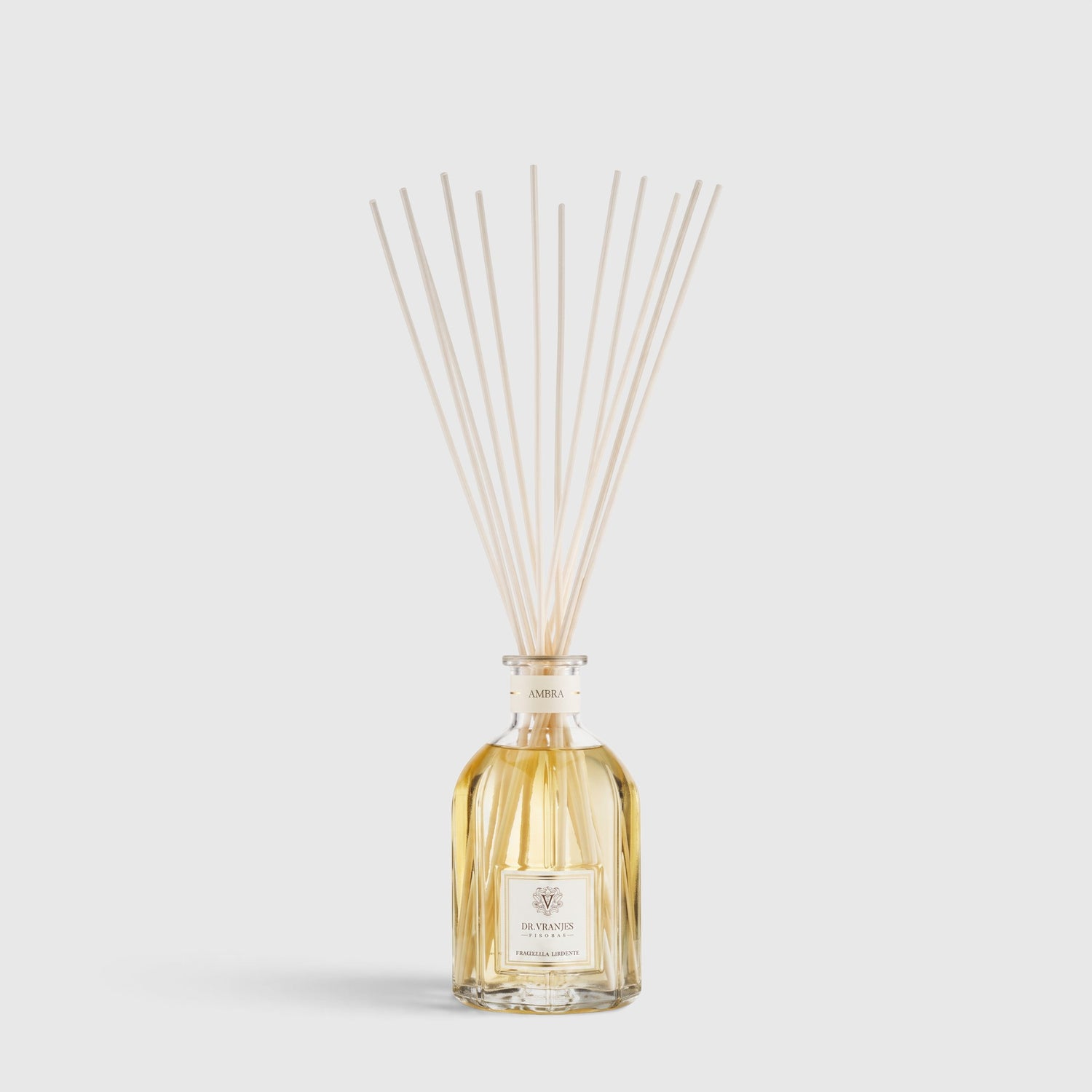 Shop Rescue Spa Ambra room diffuser in a glass bottle with long reed sticks for a luxurious home fragrance experience.