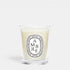 Shop Rescue Spa Ambre scented candle in a clear glass jar with a signature oval white label and woody fragrance.