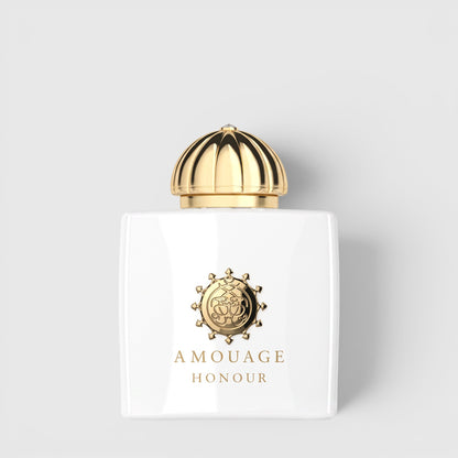 Shop Rescue Spa Amage Honour Eau De Parfum in a white glass bottle with a gold dome cap and embossed gold logo.