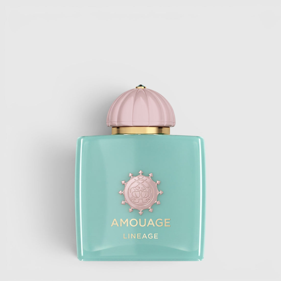 Shop Rescue Spa Amouage Lineage Eau De Parfum in a square turquoise glass bottle with a pale pink dome cap.