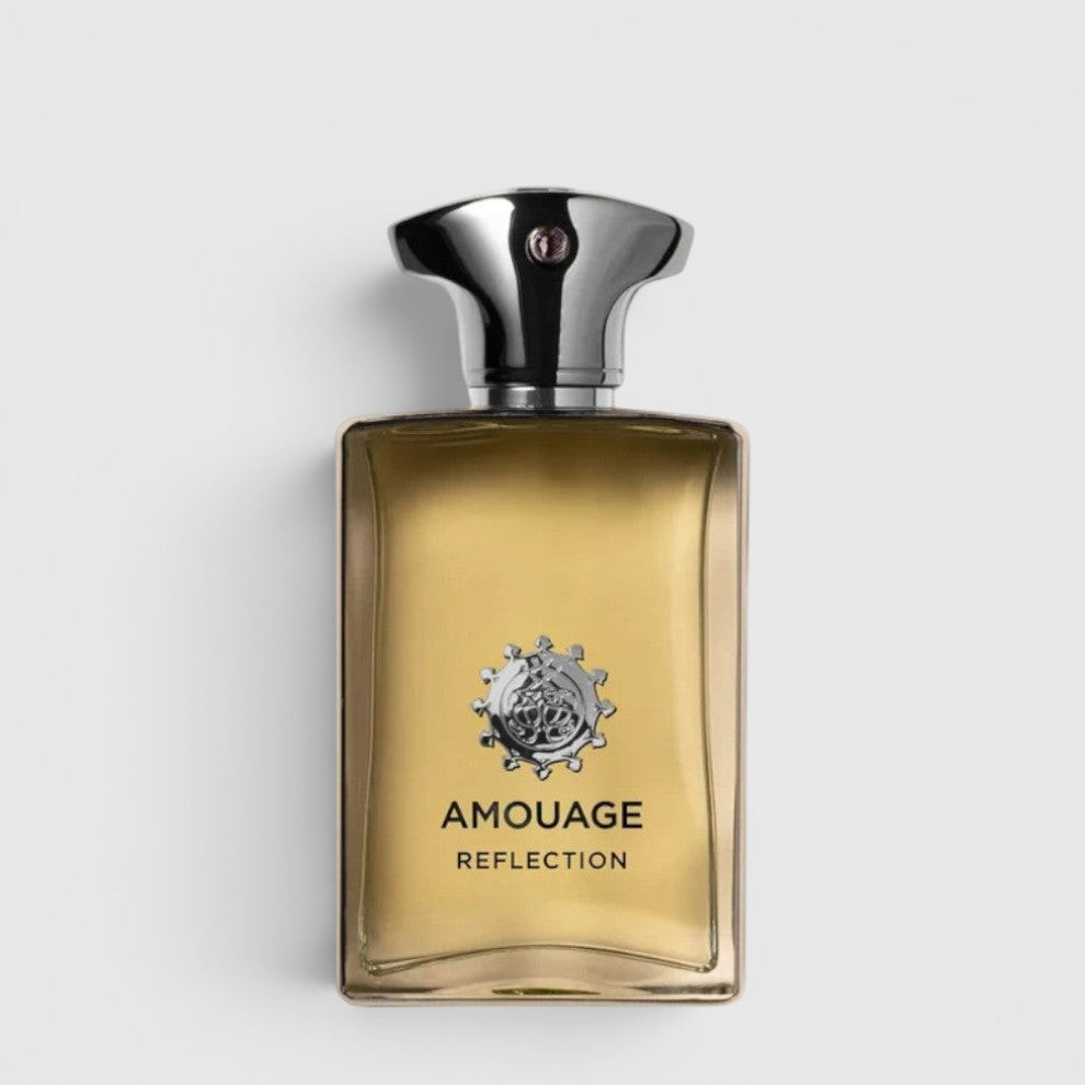 Shop Rescue Spa Amouage Reflection Man fragrance in a clear glass bottle with a silver cap on a beige background.