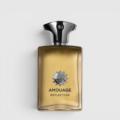 Shop Rescue Spa Amouage Reflection Man fragrance in a clear glass bottle with a silver cap on a beige background.