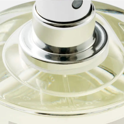 Shop Rescue Spa Animalique Eau De Parfum 50ml, clear glass bottle with silver spray nozzle, light yellow liquid.