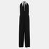 Shop Rescue Spa Arjuna black loose jumpsuit with a deep V neckline, backless design, and wraparound halter tie.