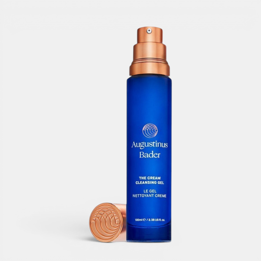 Shop Rescue Spa Augustinus Bader The Cream Cleansing Gel in a blue glass bottle with a metallic copper pump