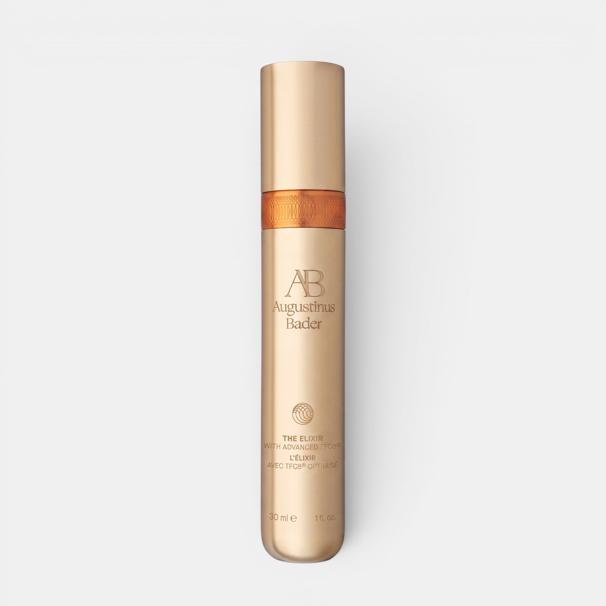 Shop Rescue Spa Augustinus Bader The Elixir anti-aging serum in a sleek metallic gold 30ml pump bottle.