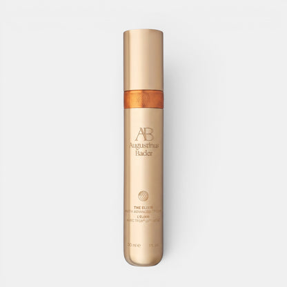 Shop Rescue Spa Augustinus Bader The Elixir anti-aging serum in a sleek metallic gold 30ml pump bottle.