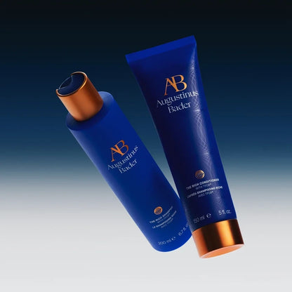 Shop Rescue Spa Augustinus Bader The Rich Conditioner and shampoo bottles in blue packaging with copper caps