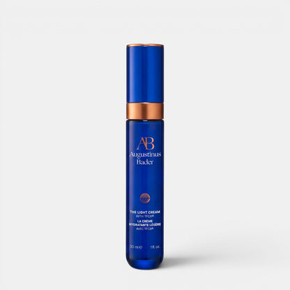 Shop Rescue Spa Augustinus Bader The Light Cream 30ml in a sleek blue bottle with copper accents for matte hydration.