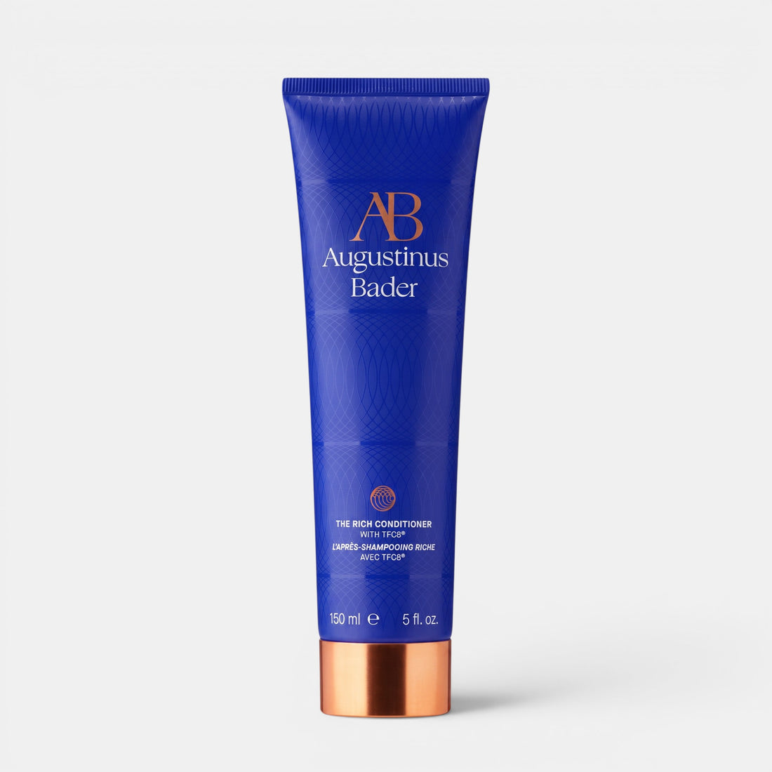 Shop Rescue Spa Augustinus Bader The Rich Conditioner in a blue 150ml tube with a metallic copper cap.
