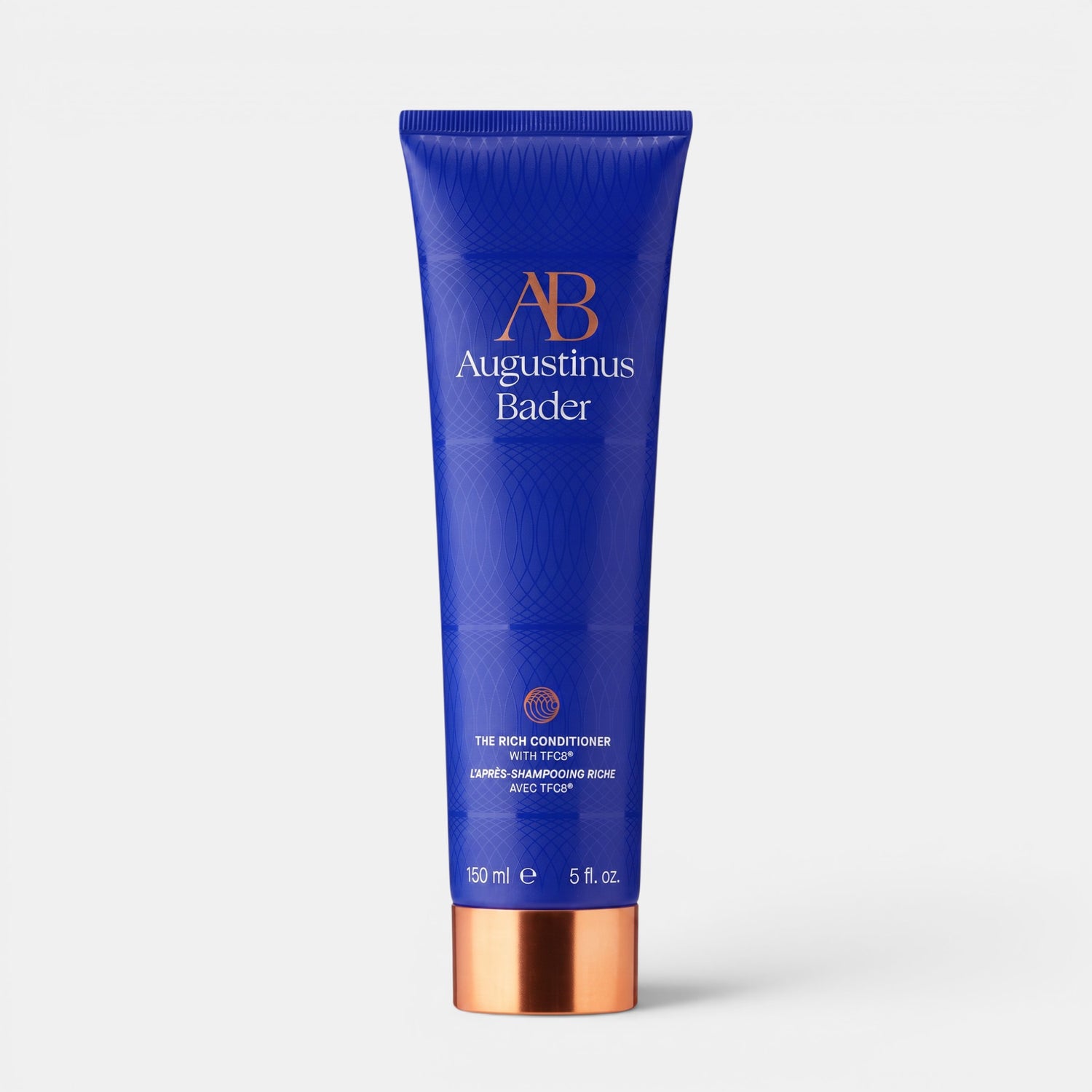 Shop Rescue Spa Augustinus Bader The Rich Conditioner in a blue 150ml tube with a metallic copper cap.