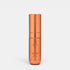 Shop Rescue Spa Augustinus Bader The Serum Nomad 15ml in a metallic copper cylindrical bottle for skin rejuvenation.