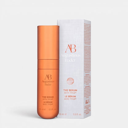 Shop Rescue Spa Augustinus Bader The Serum Nomad 15ml in a metallic orange bottle with its matching white product box.