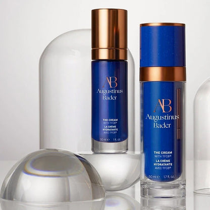 Shop Rescue Spa Augustinus Bader The Cream moisturizer bottles in 30ml and 50ml sizes with blue and bronze packaging.