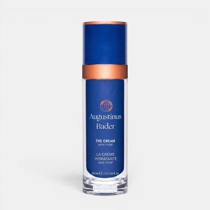 Shop Rescue Spa Augustinus Bader The Cream moisturizer in a blue 50ml pump bottle with copper accents.