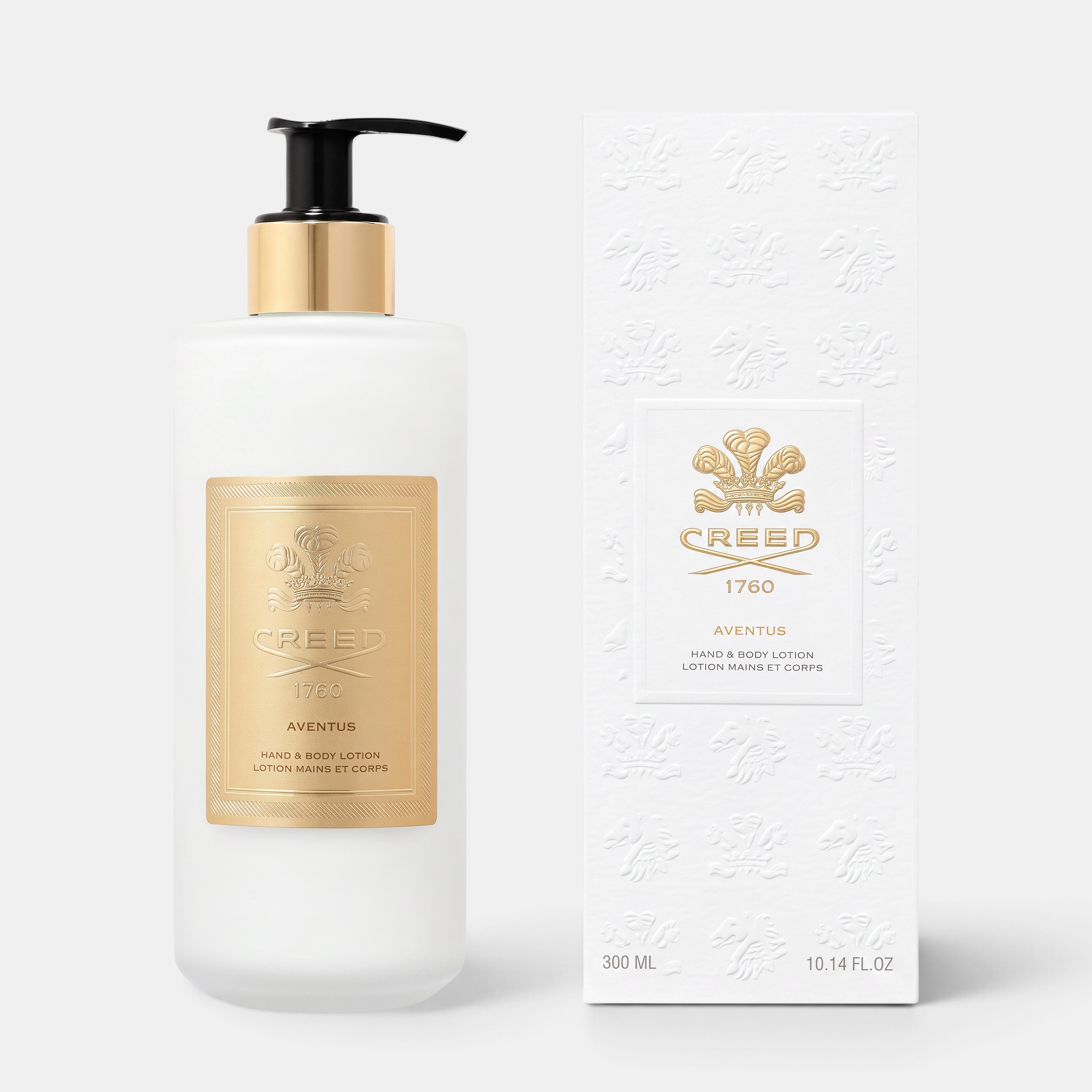 Shop Rescue Spa Aventus Hand &amp; Body Lotion in a frosted glass bottle with gold label and matching white gift box.