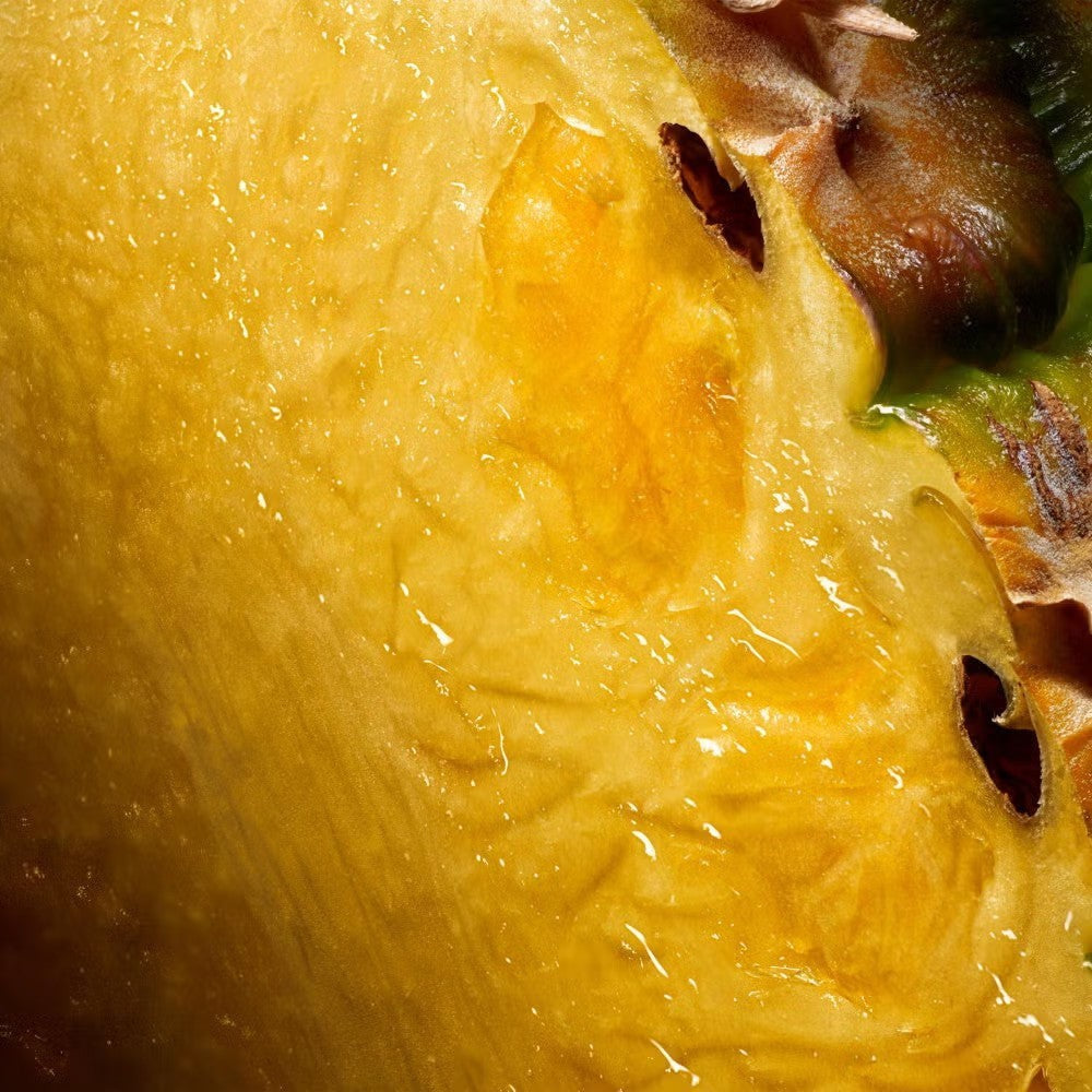 Shop Rescue Spa Aventus fragrance featuring a close-up of fresh, juicy pineapple notes