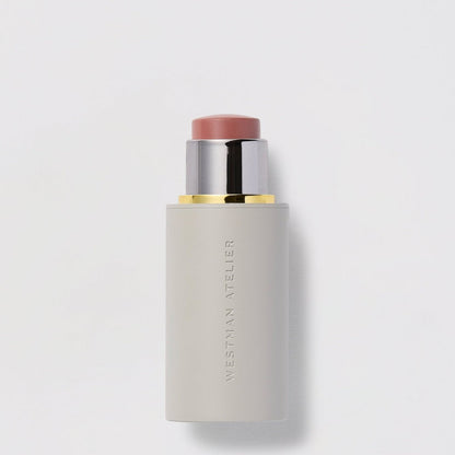 Shop Rescue Spa Baby Cheeks Blush Stick in a creamy dusty rose shade with a sleek grey twist-up applicator.