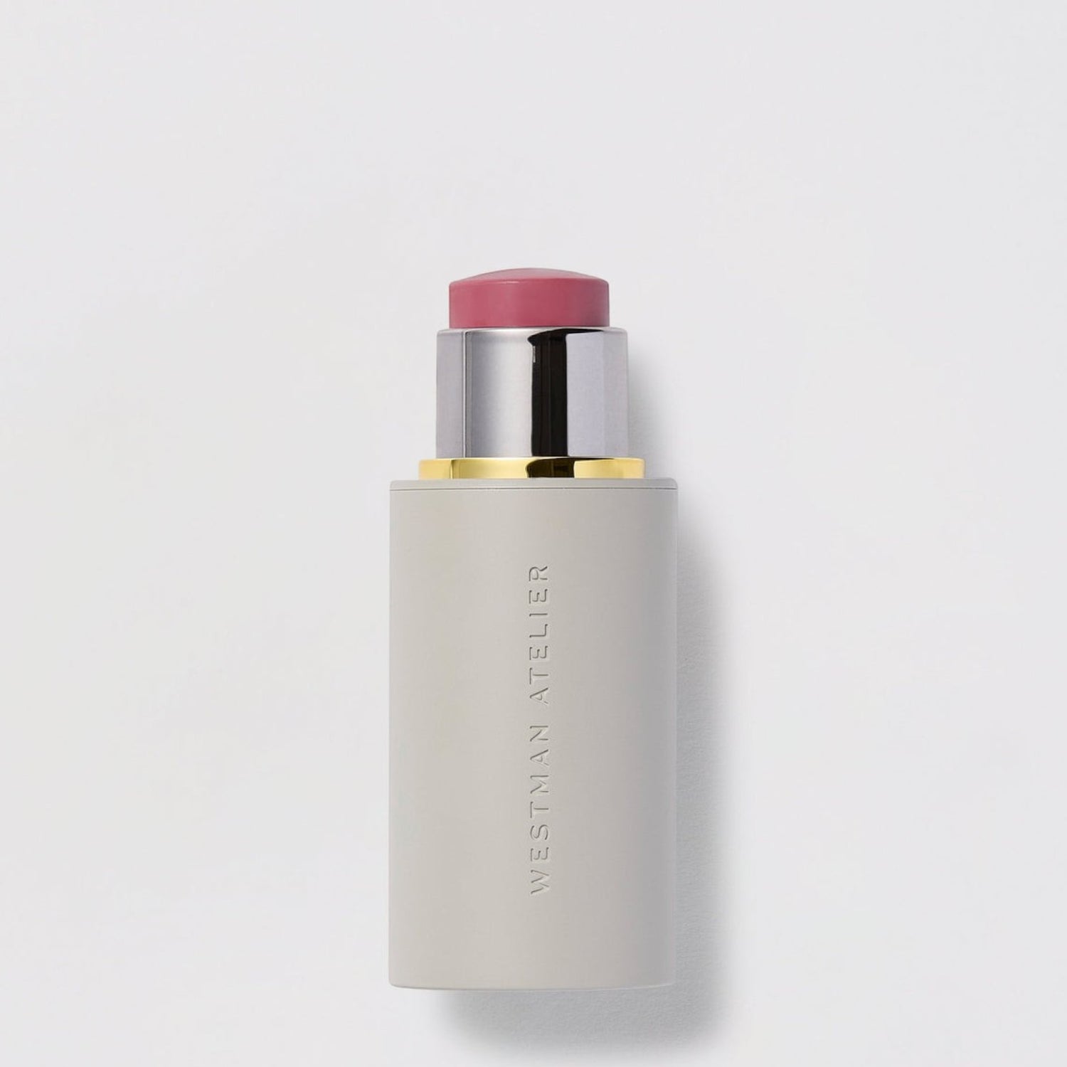 Shop Rescue Spa Baby Cheeks Blush Stick in a creamy pink shade with a sleek, minimalist grey applicator tube.