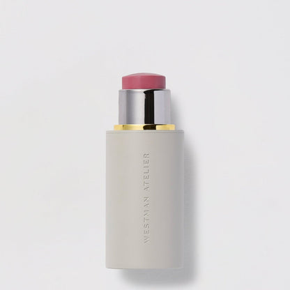 Shop Rescue Spa Baby Cheeks Blush Stick in a creamy pink shade with a sleek, minimalist grey applicator tube.