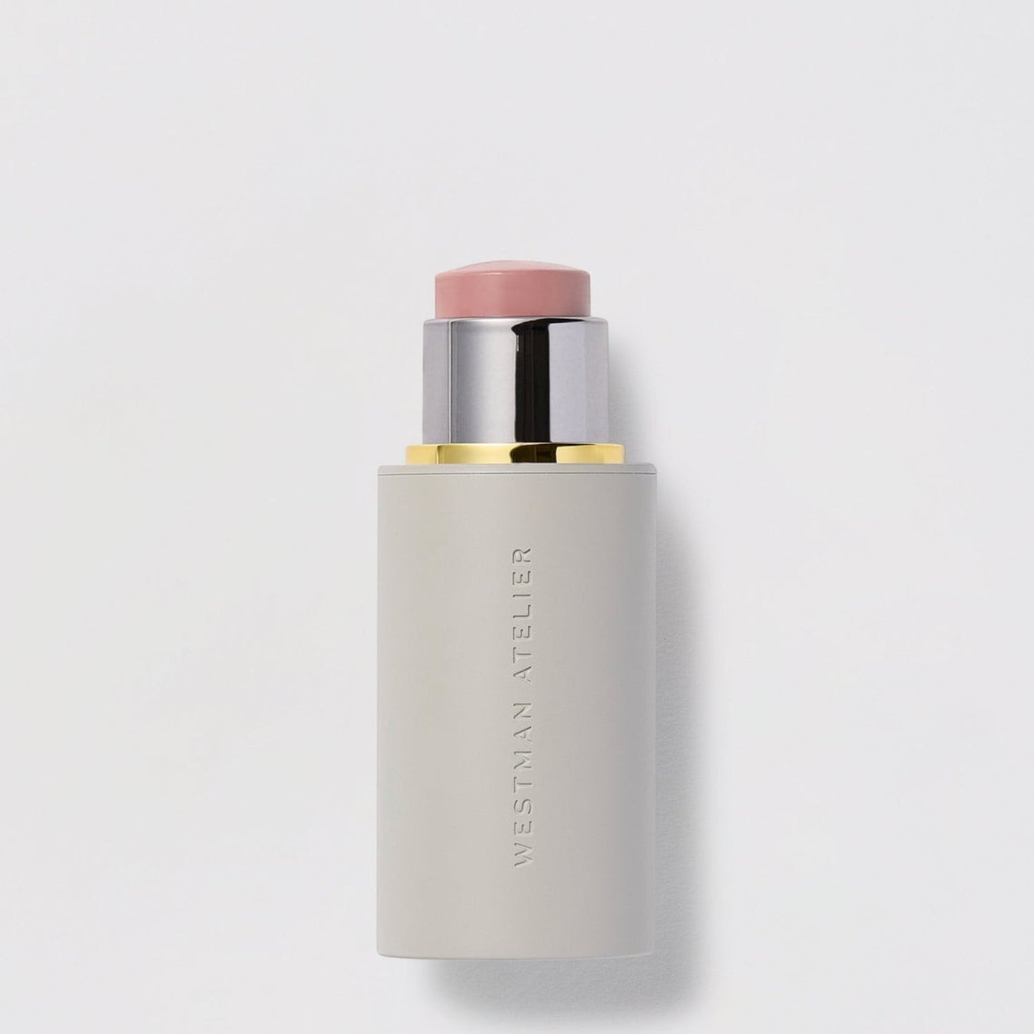 Shop Rescue Spa Baby Cheeks Blush Stick in a creamy pink shade with a sleek grey twist-up applicator tube.