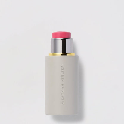 Shop Rescue Spa Baby Cheeks Blush Stick in a vibrant pink shade with a sleek grey twist-up applicator tube.