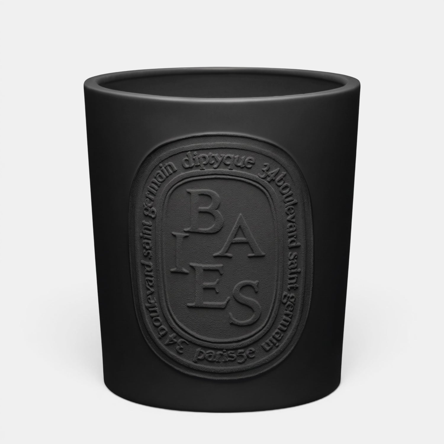 Shop Rescue Spa Baies scented candle in a matte black glass vessel with an embossed oval logo label