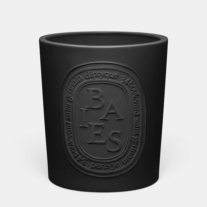 Shop Rescue Spa Baies scented candle in a matte black glass vessel with an embossed oval logo label