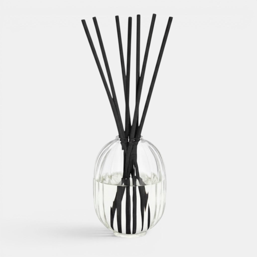 Shop Rescue Spa Baies home fragrance diffuser in a faceted glass bottle with black rattan sticks for large spaces.