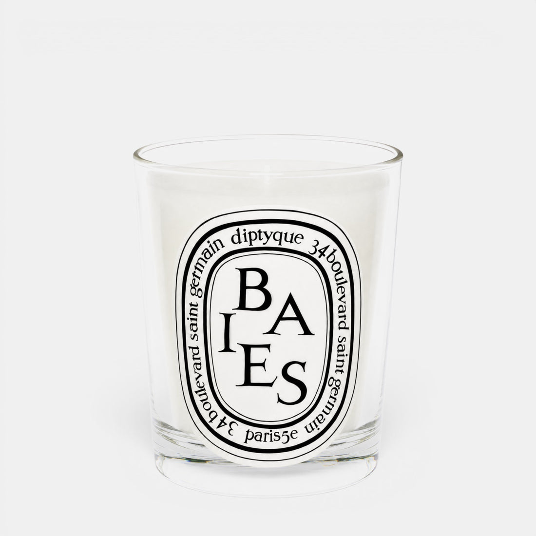 Shop Rescue Spa Baies scented candle in a clear glass jar with a signature black and white oval label