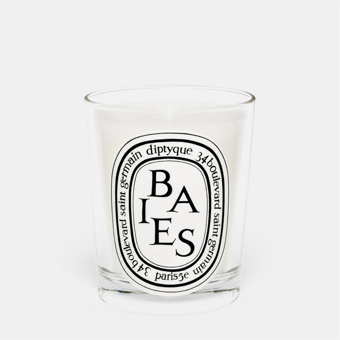 Shop Rescue Spa Baies scented candle in a clear glass jar with a white wax blend and iconic oval label