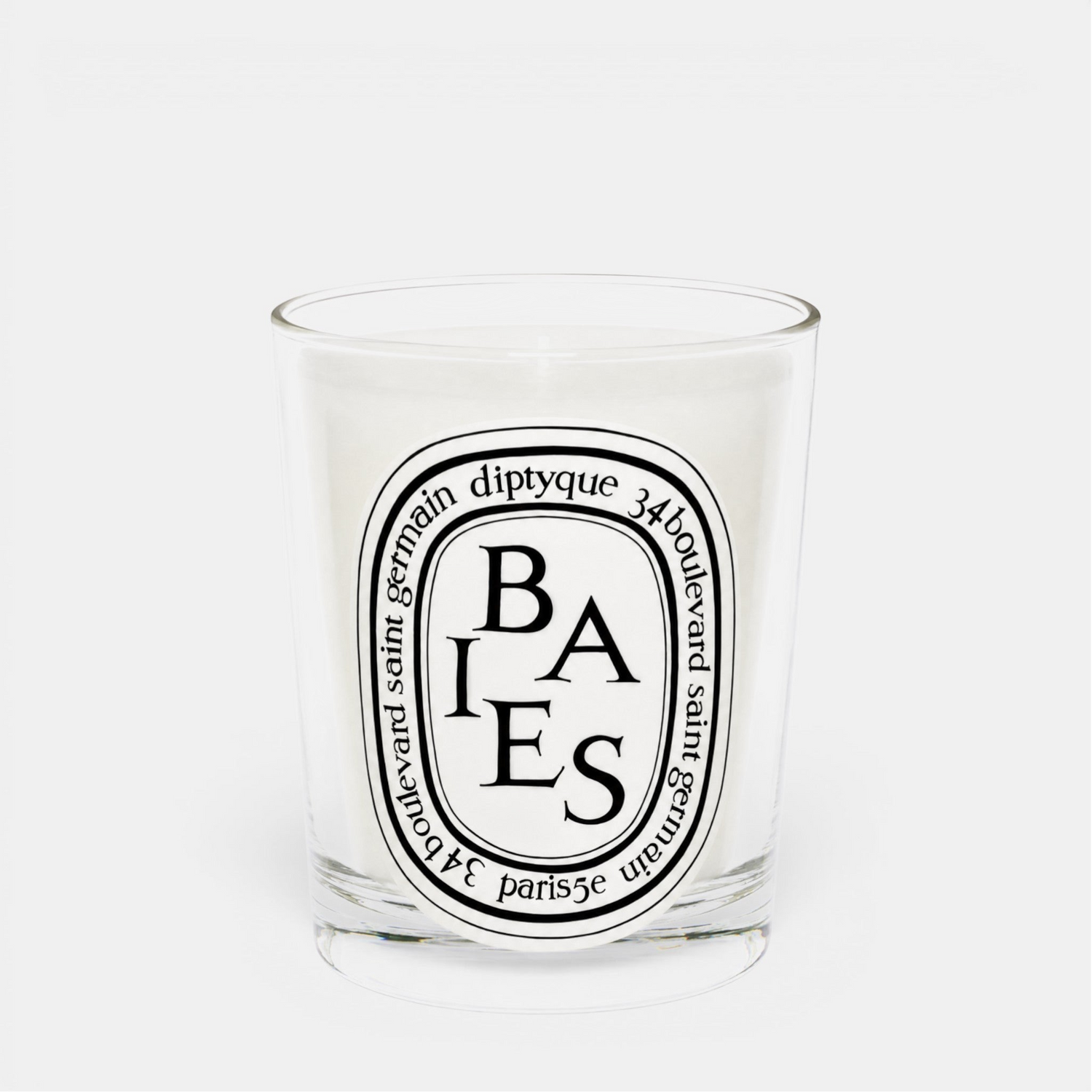 Shop Rescue Spa Baies scented candle in a clear glass jar with a white wax blend and iconic oval label