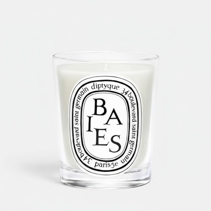 Shop Rescue Spa Baies scented candle in a clear glass vessel with a white wax blend and signature oval label.