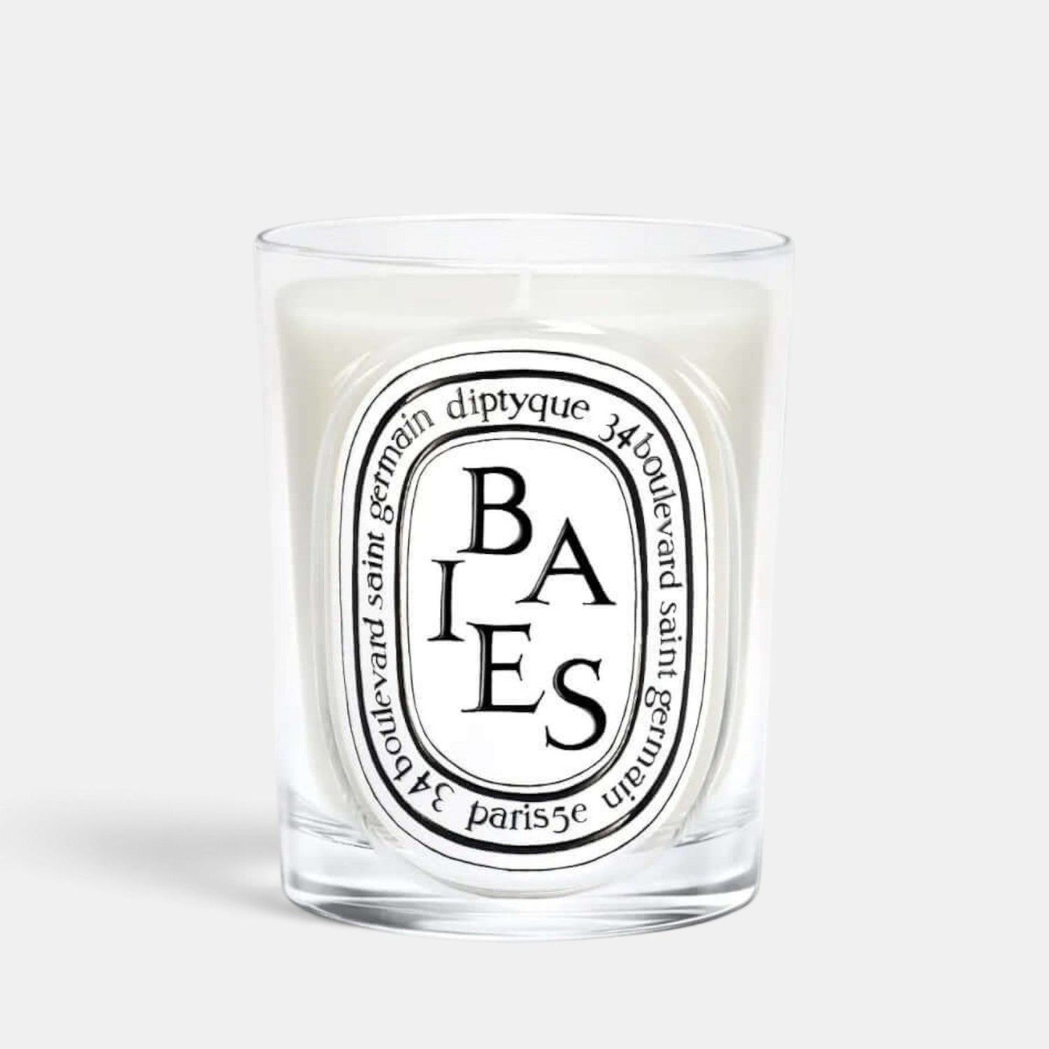 Shop Rescue Spa Baies scented candle in a clear glass vessel with a black and white label featuring blackcurrant notes