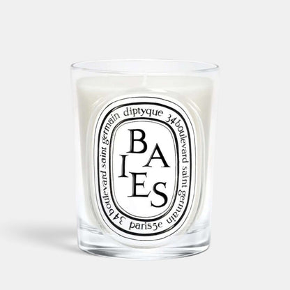 Shop Rescue Spa Baies scented candle in a clear glass vessel with a black and white label featuring blackcurrant notes