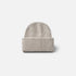 Shop Rescue Spa beige ribbed knit cashmere beanie with a folded cuff, unisex design.