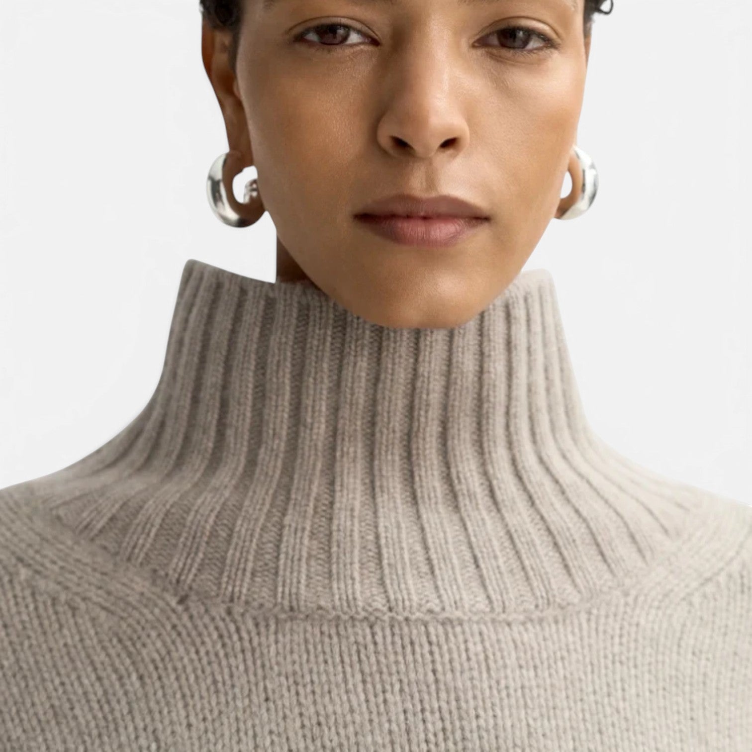 Shop Rescue Spa Girlfriend turtleneck in beige chunky knit 100% cashmere with a ribbed high neck