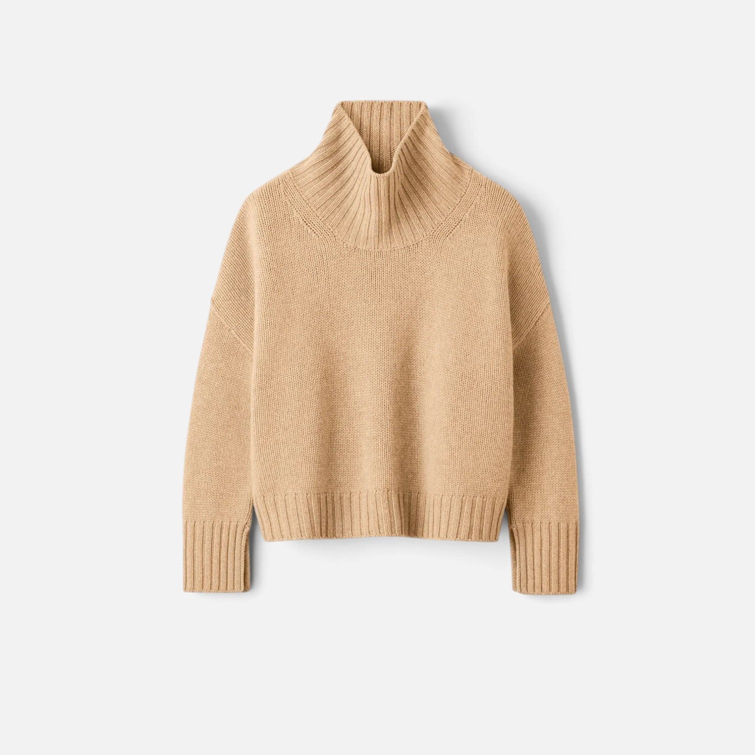Shop Rescue Spa beige chunky knit cashmere turtleneck sweater with sleeve slits in a relaxed fit