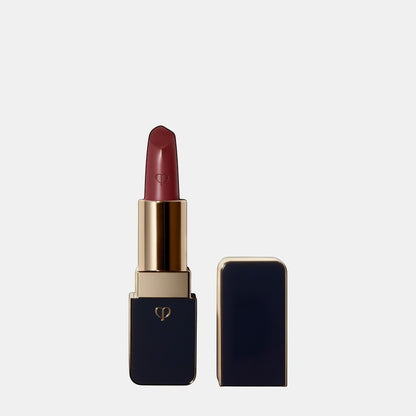 Shop Rescue Spa luxurious satin lipstick in a deep berry shade with a lustrous finish and gold accents.