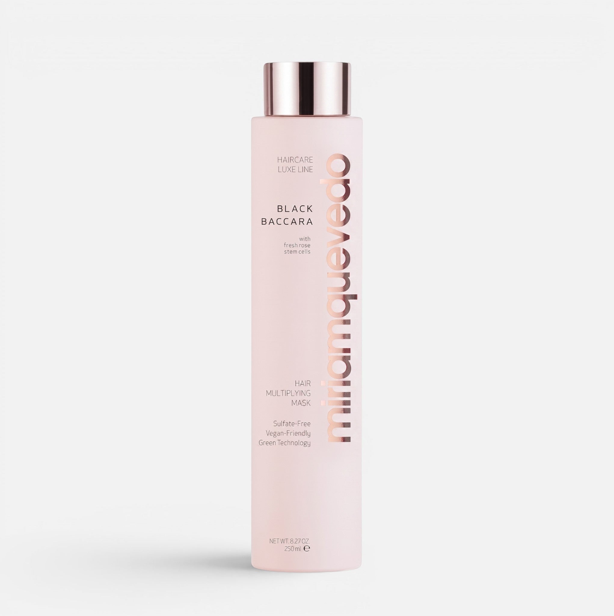 Shop Rescue Spa Black Baccara Hair Multiplying Mask in a pale pink bottle with rose gold cap and elegant typography.