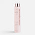 Shop Rescue Spa Black Baccara Hair Multiplying Mask in a pale pink bottle with rose gold cap and elegant typography.
