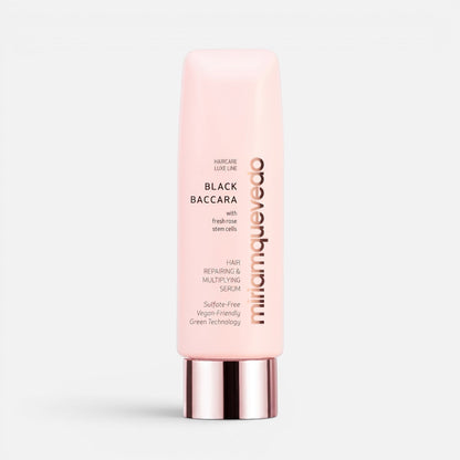 Shop Rescue Spa Black Baccara hair repairing and multiplying serum in a light pink squeeze tube with metallic cap.